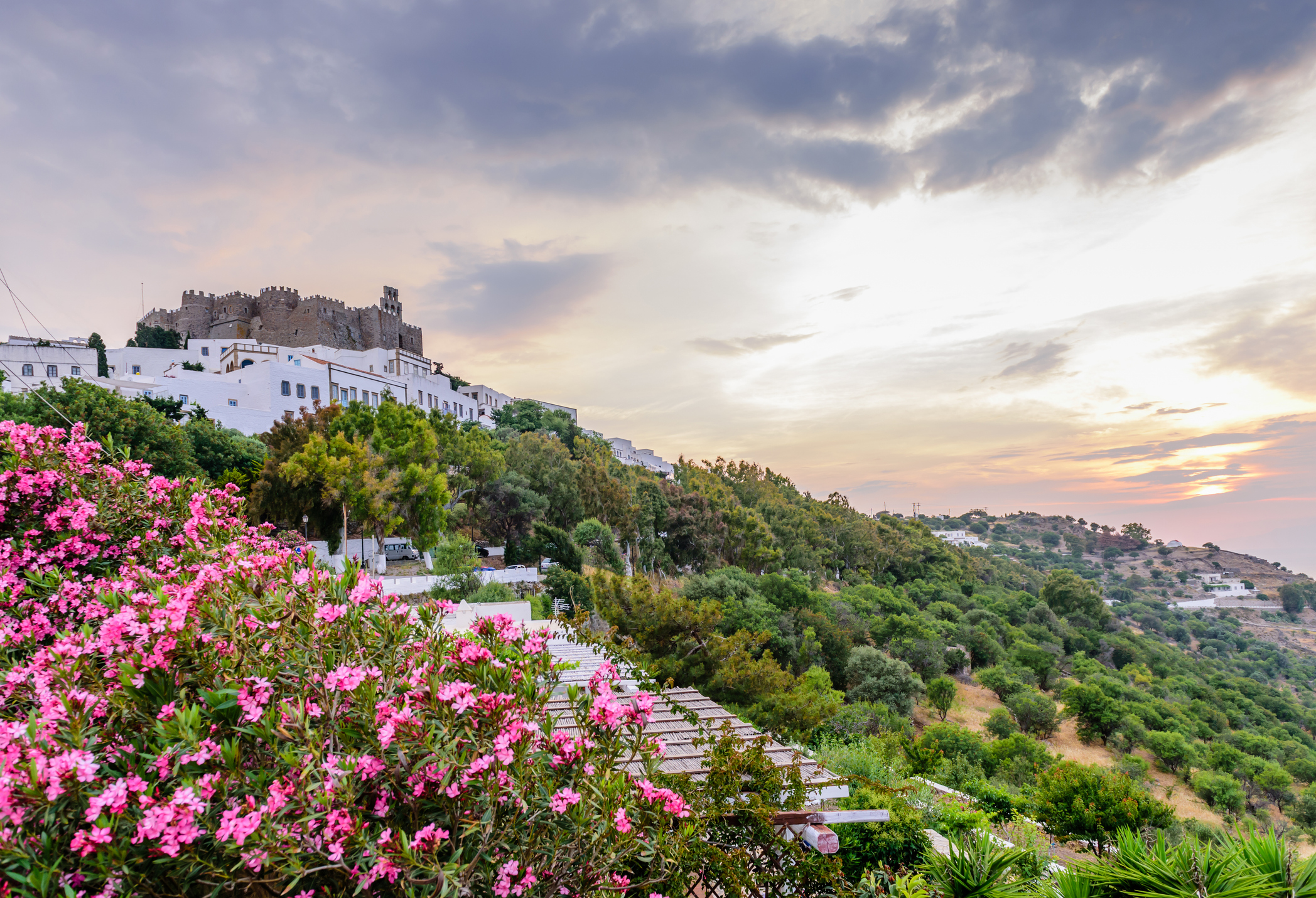 View of Monastery of st. John in Patmos island, Dodecanese, Greece. Unesco heritage site. Sunset view.
